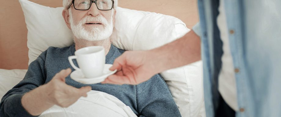 Elderly Man Being Cared For